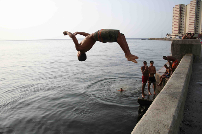 Film still of Elio doing a backflip